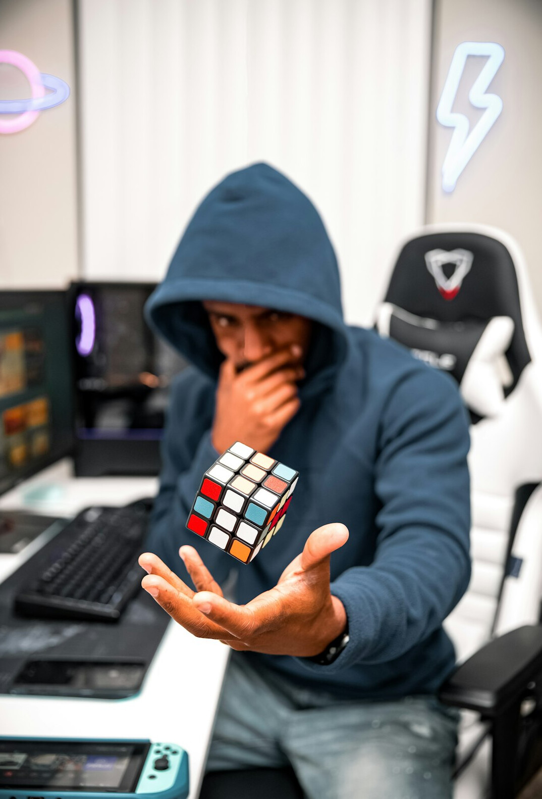 Programmer analyzing code on a laptop screen at a desk